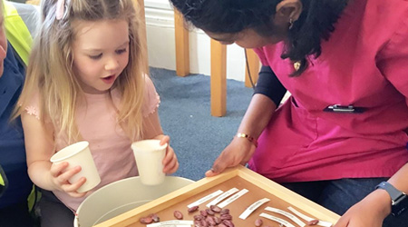 Little Hands, Green Thumbs: Reigate Holmesdale Road Nursery visit Wray Common Care Home